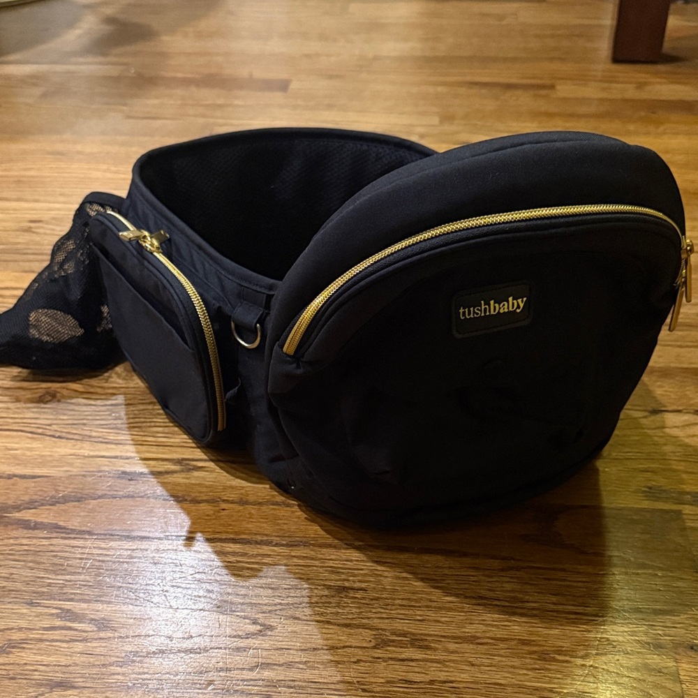 Tushbaby Hip Carrier Black and Gold